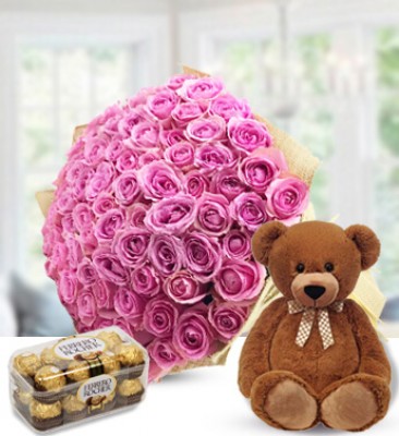 Bunch of 60 Pink roses with 16 pcs Ferraro Rocher Chocolate and Small Teddy bear Prominence