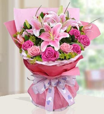 Bunch of 2 Stem of Pink Lilies & 10 Stem of Pink Roses with fillers in nice wrapping Summer Medley Bouquet