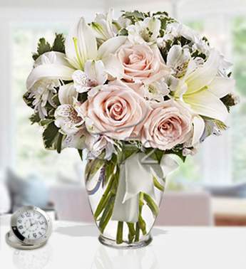 Bunch of 3 stems of White Alstromeria, 2 stems of White Chrysanthemum, 2 stems of White Lily, 8 Peach Rose in a Glass Vase (one sided round arrangement) Beautiful Whisper