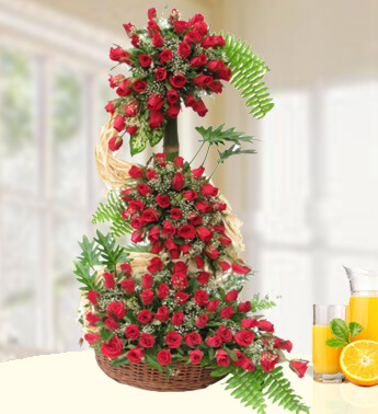 3-4 Ft Tall Arrangement of 100 Red Roses with fillers Height Of Love ( 4 Ft Tall )