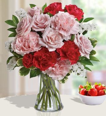 5 Pink Roses, 5 Pink and 5 red Carnations in a Glass Vase. Pinkness