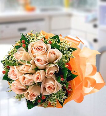 Bunch of 10 Stems of Peach Roses with Fillers in a nice wrapping. Peach Melba