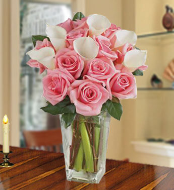 6 Calla Lilies & 12 Pink Roses in a glass vase. Fall in love