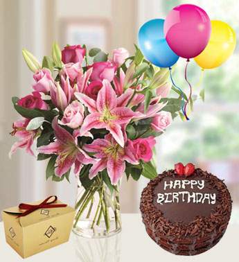 Bunch of 5 stems of Pink Lilies , 12 Pink Rose with 250 gms Of Choco Chocolate , 1 Kg Chocolate Cake and 3 Latex Balloon Passionate Pink Combo